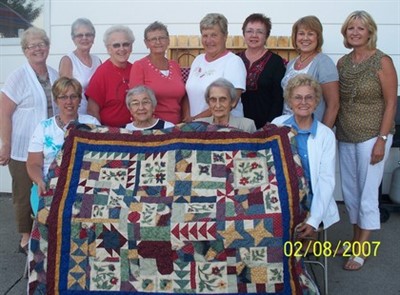 The 12 ladies that sewed the blocks together! 